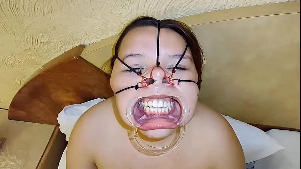 She loves the cock and balls on her bondage face