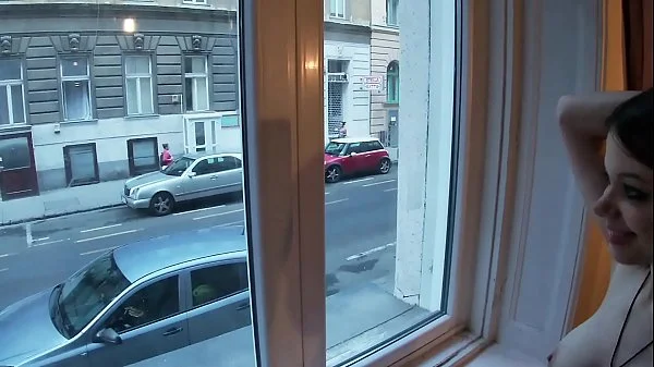 Sex at the window in front of strangers